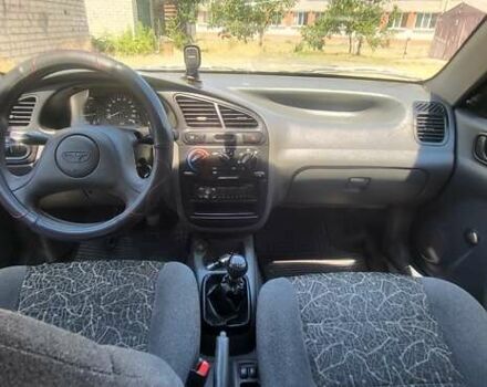 Сірий ЗАЗ Ланос, об'ємом двигуна 1.39 л та пробігом 156 тис. км за 2600 $, фото 4 на Automoto.ua