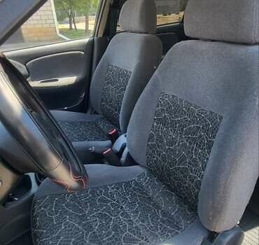 Сірий ЗАЗ Ланос, об'ємом двигуна 1.39 л та пробігом 156 тис. км за 2600 $, фото 3 на Automoto.ua