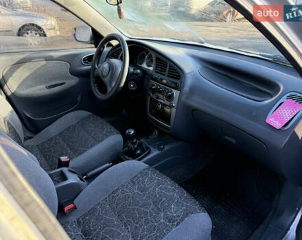 Сірий ЗАЗ Ланос, об'ємом двигуна 1.39 л та пробігом 230 тис. км за 2100 $, фото 3 на Automoto.ua