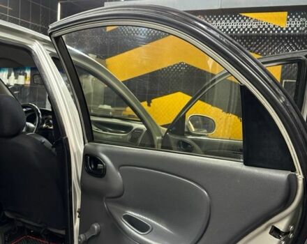 Сірий ЗАЗ Ланос, об'ємом двигуна 1.6 л та пробігом 270 тис. км за 1999 $, фото 12 на Automoto.ua