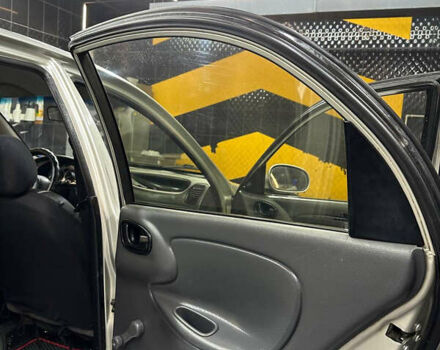 Сірий ЗАЗ Ланос, об'ємом двигуна 1.6 л та пробігом 270 тис. км за 1999 $, фото 14 на Automoto.ua