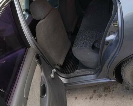 Серый ЗАЗ Ланос, объемом двигателя 1.5 л и пробегом 988 тыс. км за 2000 $, фото 3 на Automoto.ua