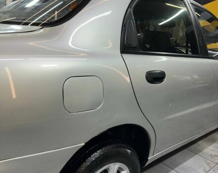 Сірий ЗАЗ Ланос, об'ємом двигуна 1.6 л та пробігом 270 тис. км за 1999 $, фото 5 на Automoto.ua