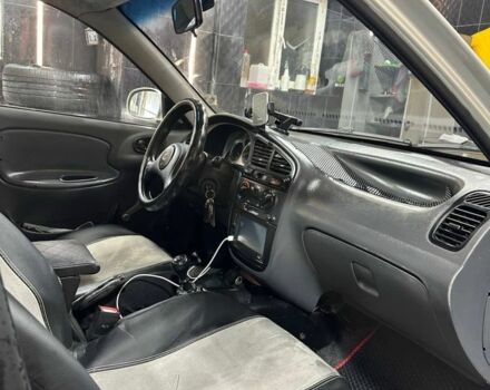 Сірий ЗАЗ Ланос, об'ємом двигуна 1.6 л та пробігом 270 тис. км за 1999 $, фото 11 на Automoto.ua