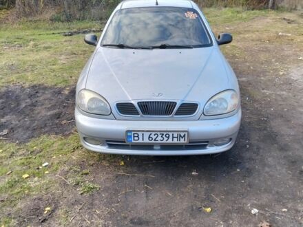 Сірий ЗАЗ Ланос, об'ємом двигуна 1.4 л та пробігом 317 тис. км за 1999 $, фото 1 на Automoto.ua