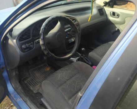 Синій ЗАЗ Ланос, об'ємом двигуна 1.4 л та пробігом 200 тис. км за 1200 $, фото 3 на Automoto.ua