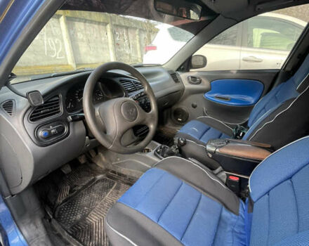 Синий ЗАЗ Ланос, объемом двигателя 1.39 л и пробегом 370 тыс. км за 1200 $, фото 4 на Automoto.ua