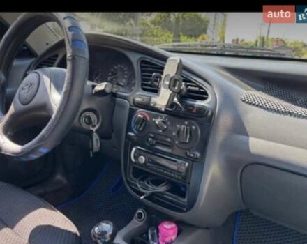 Синій ЗАЗ Ланос, об'ємом двигуна 1.39 л та пробігом 179 тис. км за 2200 $, фото 3 на Automoto.ua