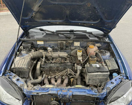 Синій ЗАЗ Ланос, об'ємом двигуна 1.5 л та пробігом 248 тис. км за 1800 $, фото 17 на Automoto.ua