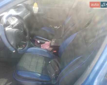 Синій ЗАЗ Ланос, об'ємом двигуна 1.4 л та пробігом 102 тис. км за 3000 $, фото 5 на Automoto.ua