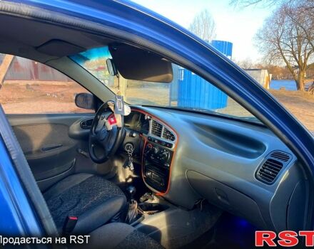 Синій ЗАЗ Ланос, об'ємом двигуна 1.4 л та пробігом 219 тис. км за 1700 $, фото 4 на Automoto.ua