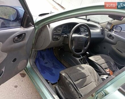 Зелений ЗАЗ Ланос, об'ємом двигуна 1.5 л та пробігом 250 тис. км за 2600 $, фото 5 на Automoto.ua