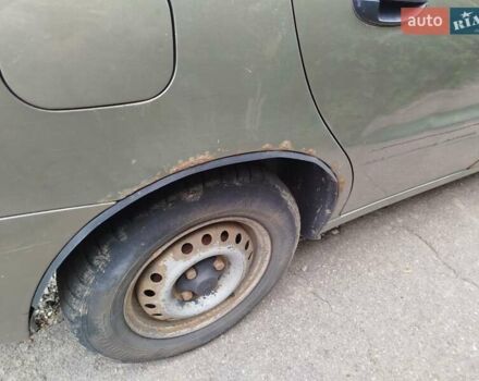 Зеленый ЗАЗ Ланос, объемом двигателя 1.39 л и пробегом 242 тыс. км за 1100 $, фото 4 на Automoto.ua