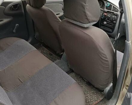 Зелений ЗАЗ Ланос, об'ємом двигуна 1.39 л та пробігом 111 тис. км за 2500 $, фото 7 на Automoto.ua