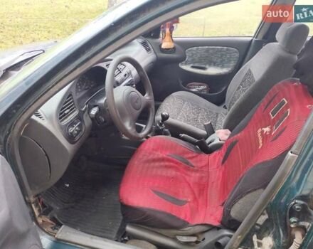 Зеленый ЗАЗ Ланос, объемом двигателя 1.6 л и пробегом 500 тыс. км за 650 $, фото 7 на Automoto.ua