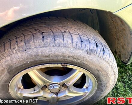 Зеленый ЗАЗ Ланос, объемом двигателя 1.5 л и пробегом 216 тыс. км за 3300 $, фото 6 на Automoto.ua