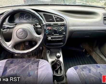 Зелений ЗАЗ Ланос, об'ємом двигуна 1.5 л та пробігом 260 тис. км за 1999 $, фото 4 на Automoto.ua