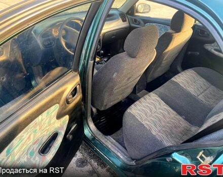 Зеленый ЗАЗ Ланос, объемом двигателя 1.5 л и пробегом 230 тыс. км за 2100 $, фото 7 на Automoto.ua