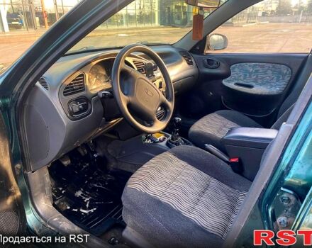 Зеленый ЗАЗ Ланос, объемом двигателя 1.5 л и пробегом 230 тыс. км за 2100 $, фото 4 на Automoto.ua