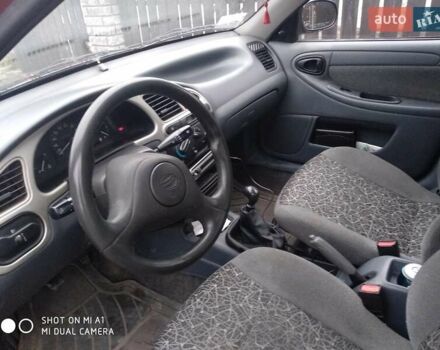 Красный ЗАЗ Сенс, объемом двигателя 1.3 л и пробегом 163 тыс. км за 1800 $, фото 3 на Automoto.ua