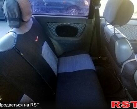 Красный ЗАЗ Таврия, объемом двигателя 1.3 л и пробегом 214 тыс. км за 1350 $, фото 5 на Automoto.ua