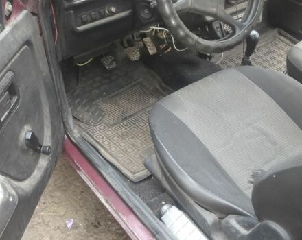 Красный ЗАЗ Таврия, объемом двигателя 1 л и пробегом 100 тыс. км за 750 $, фото 4 на Automoto.ua