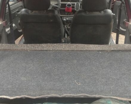 Красный ЗАЗ Таврия, объемом двигателя 1 л и пробегом 100 тыс. км за 750 $, фото 1 на Automoto.ua