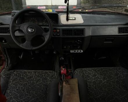 Красный ЗАЗ Таврия, объемом двигателя 1.2 л и пробегом 117 тыс. км за 650 $, фото 4 на Automoto.ua