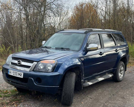 Синий ЗХ Лендмарк, объемом двигателя 2.35 л и пробегом 220 тыс. км за 4500 $, фото 1 на Automoto.ua