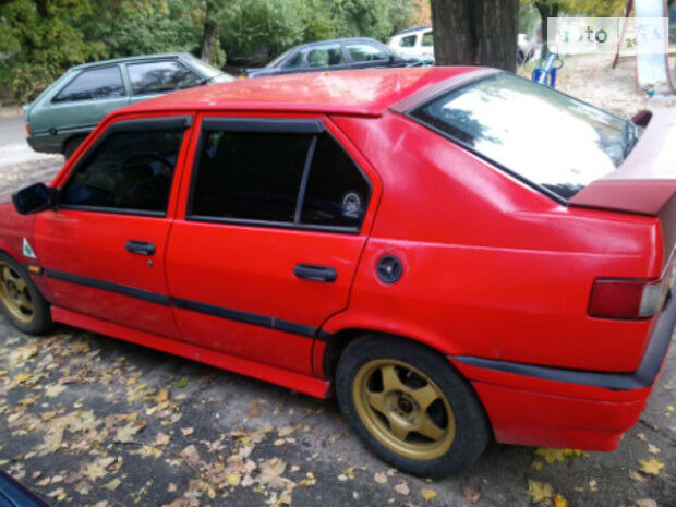 Альфа Ромео 33 1994 года Alfa Romeo 33 1994 года