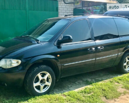 Фото на отзыв с оценкой 4.4 о Chrysler Grand Voyager 2004 году выпуска от автора "Іван" с текстом: Чудове сімейне авто, з можливістю виїхати на природу, рибалку. Завдяки повному приводу може проїх...