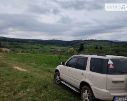 Фото на відгук з оцінкою 5   про авто Honda CR-V 1999 року випуску від автора “Валерий Панибратченко” з текстом: Цей кросовер хоч і старенький, але достойний уваги. Салон бомба. Місця в салоні дуже багато. Пере...