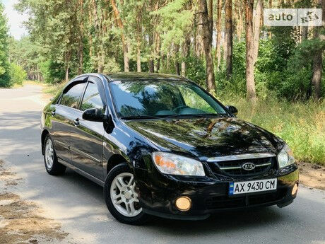 Киа Черато 2006 року Kia Cerato 2006 року