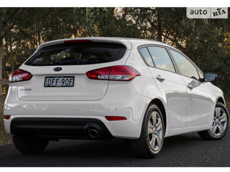 Киа Черато 2004 року Kia Cerato 2004 року