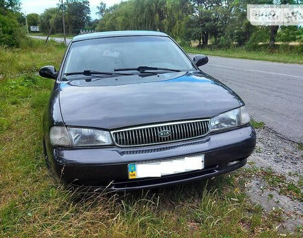 Фото на відгук з оцінкою 4.2   про авто Kia Clarus 1998 року випуску від автора “Марина” з текстом: Хорошее авто! Несмотря на то, что авто 98 года оно очень комфортное. Мягкая в управлении. Хорошая...