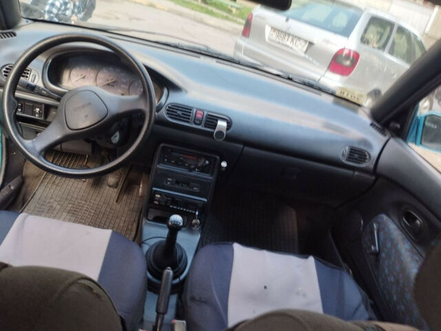 Mazda 121 1996 года