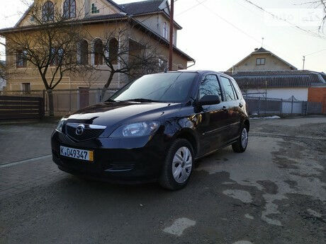 Мазда 2 2005 року Mazda 2 2005 року