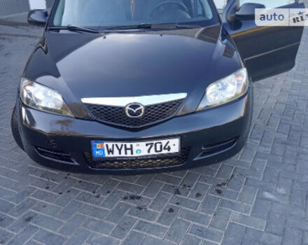 Фото на відгук з оцінкою 3   про авто Mazda 2 2005 року випуску від автора “Дима” з текстом: Машина красивая, но жестковата, пластик дешёвый, лакокрасочное покрытие плохое и ещё расход . Сме...