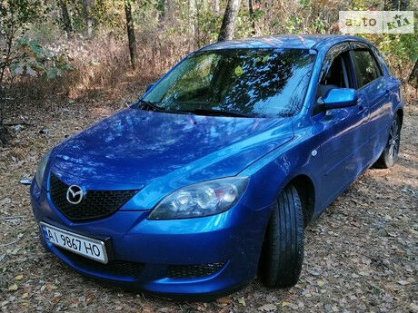 Мазда 3 2005 року Mazda 3 2005 року
