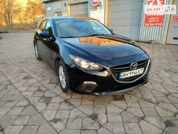 Mazda 3 2015 года