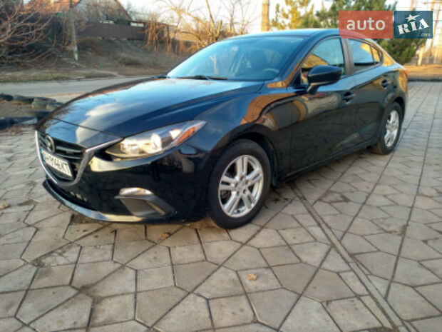 Mazda 3 2015 года