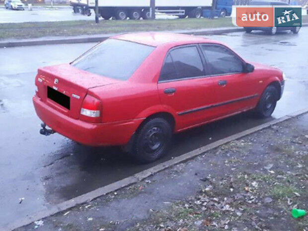 Mazda 323 1999 года