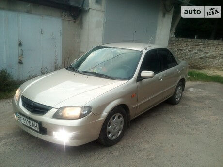 Mazda 323 2003 года