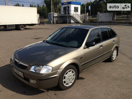 Mazda 323 1999 года