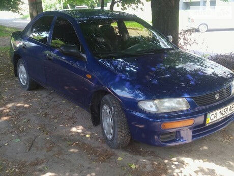 Mazda 323 1997 года