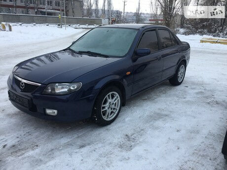 Mazda 323 2003 года