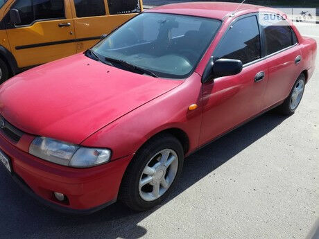 Mazda 323 1997 года