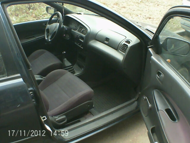 Mazda 323 1995 года