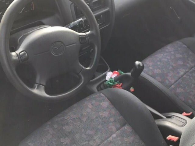 Mazda 323 1997 года
