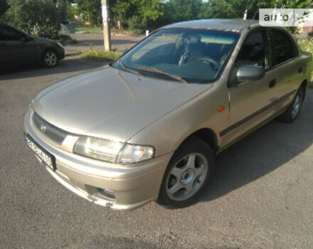 Фото на відгук з оцінкою 4   про авто Mazda 323 1997 року випуску від автора “Антон” з текстом: Мотор, 1.8, для этого поколения авто, не очень часто использовался, хорошая комплектация. Все Эле...